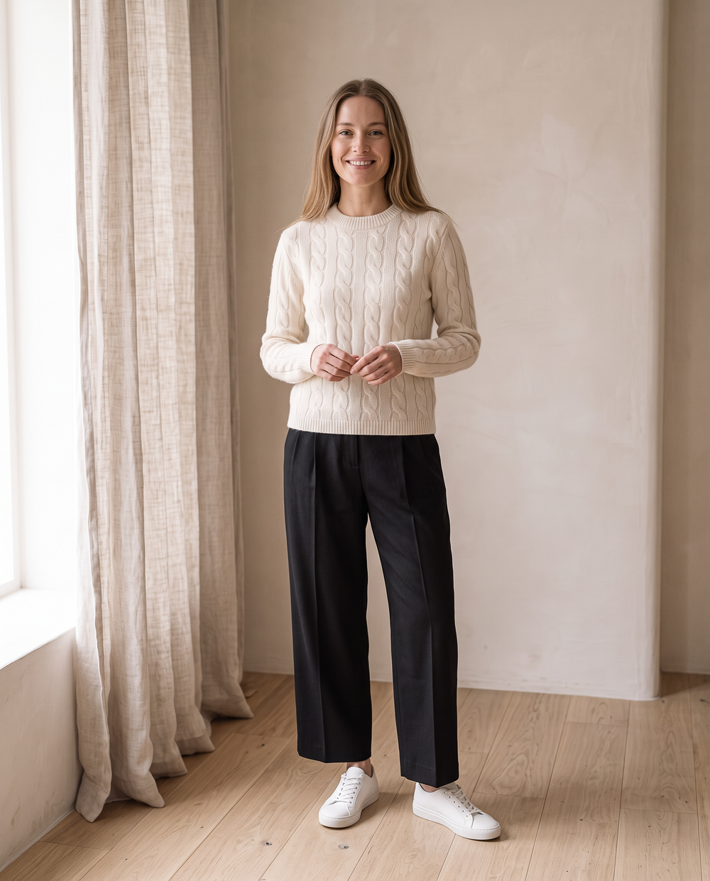 Merino Wool Cable-Knit Sweater in Cream with the Tailored Ankle Trousers in Black